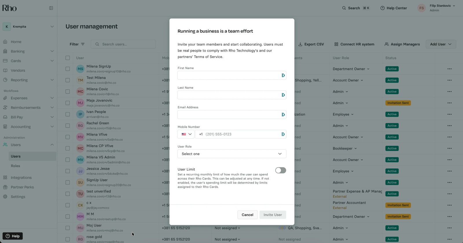 The old invite: a modal over the user table asking for name, email, mobile number, user role and a user limit